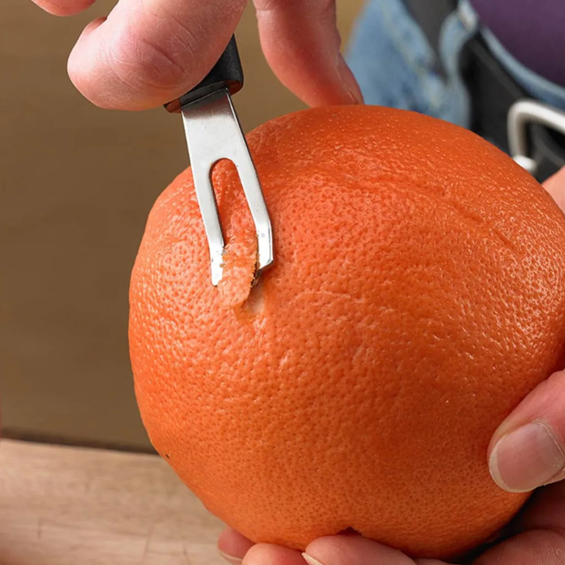 conome_pour_orange_0.webp Hot Économe pour orange Couteaux